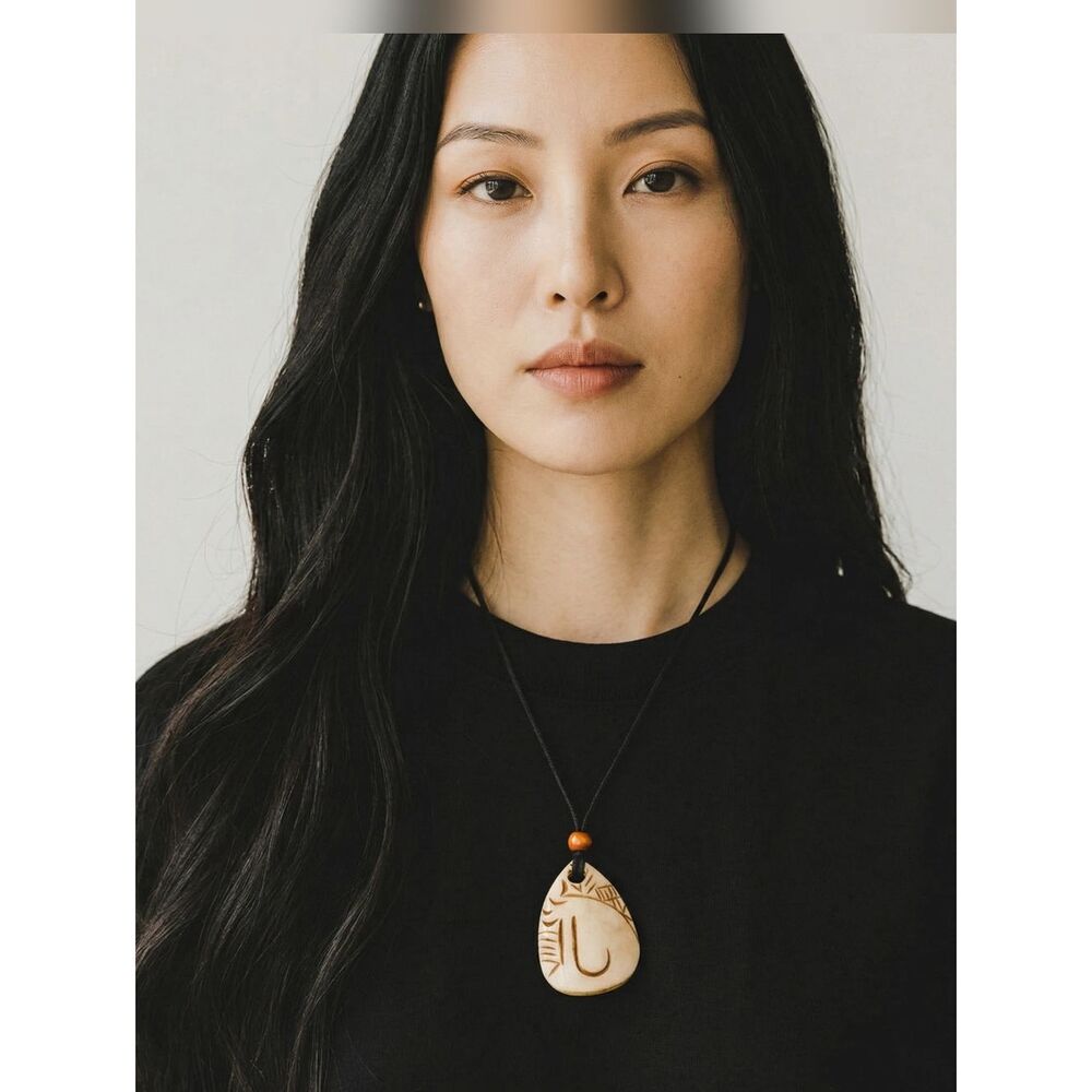 Carved Cream Pendant Necklace with Black Adjustable Cord